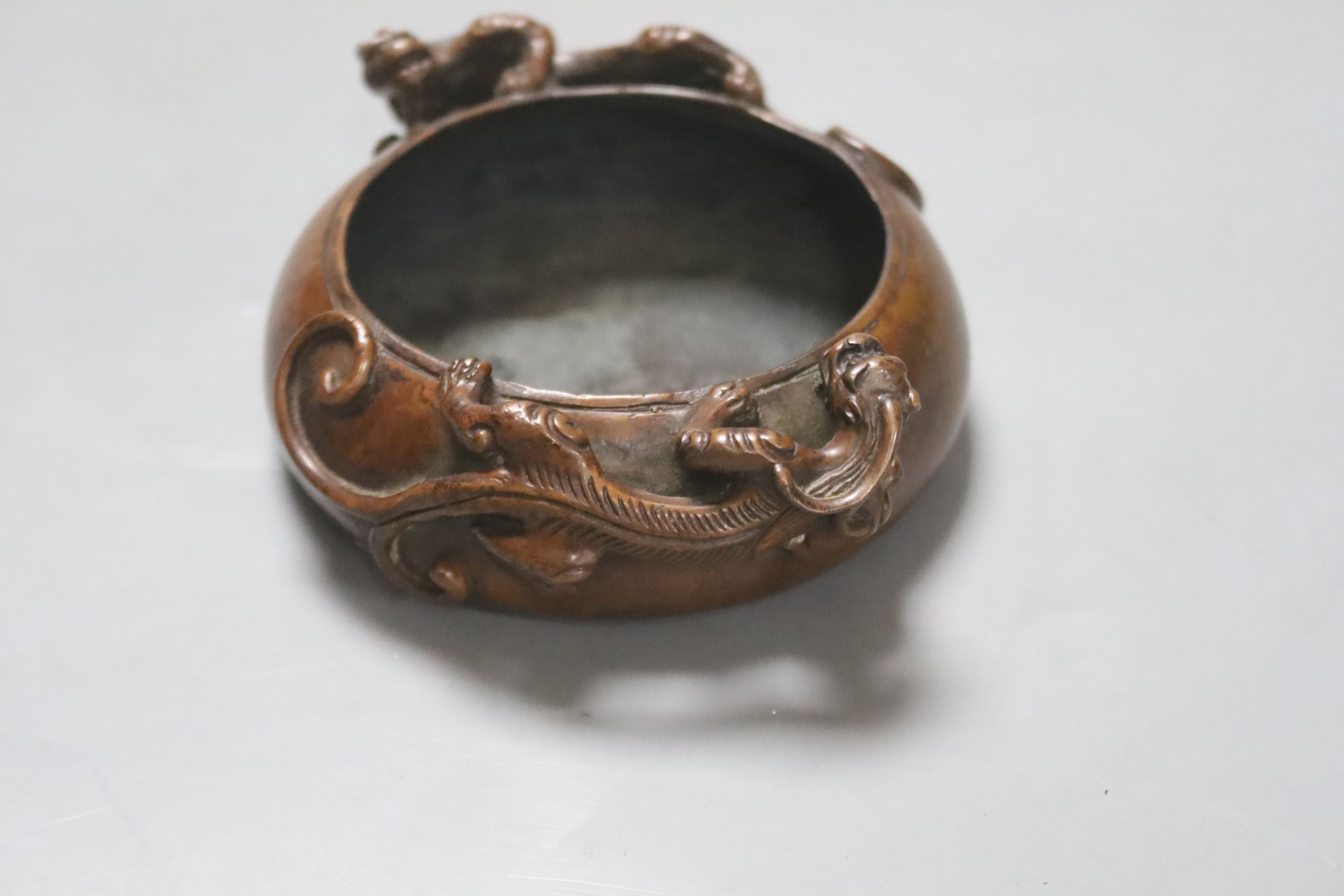 A small Chinese copper alloy ‘chilong’ censer, 11cm